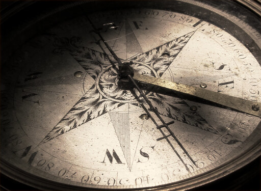 a photo of an old compass. source: https://www.flickr.com/photos/waltstoneburner/6170496511/